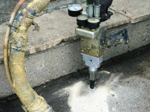 Advantages of Slab Jacking Over Full Concrete Replacement